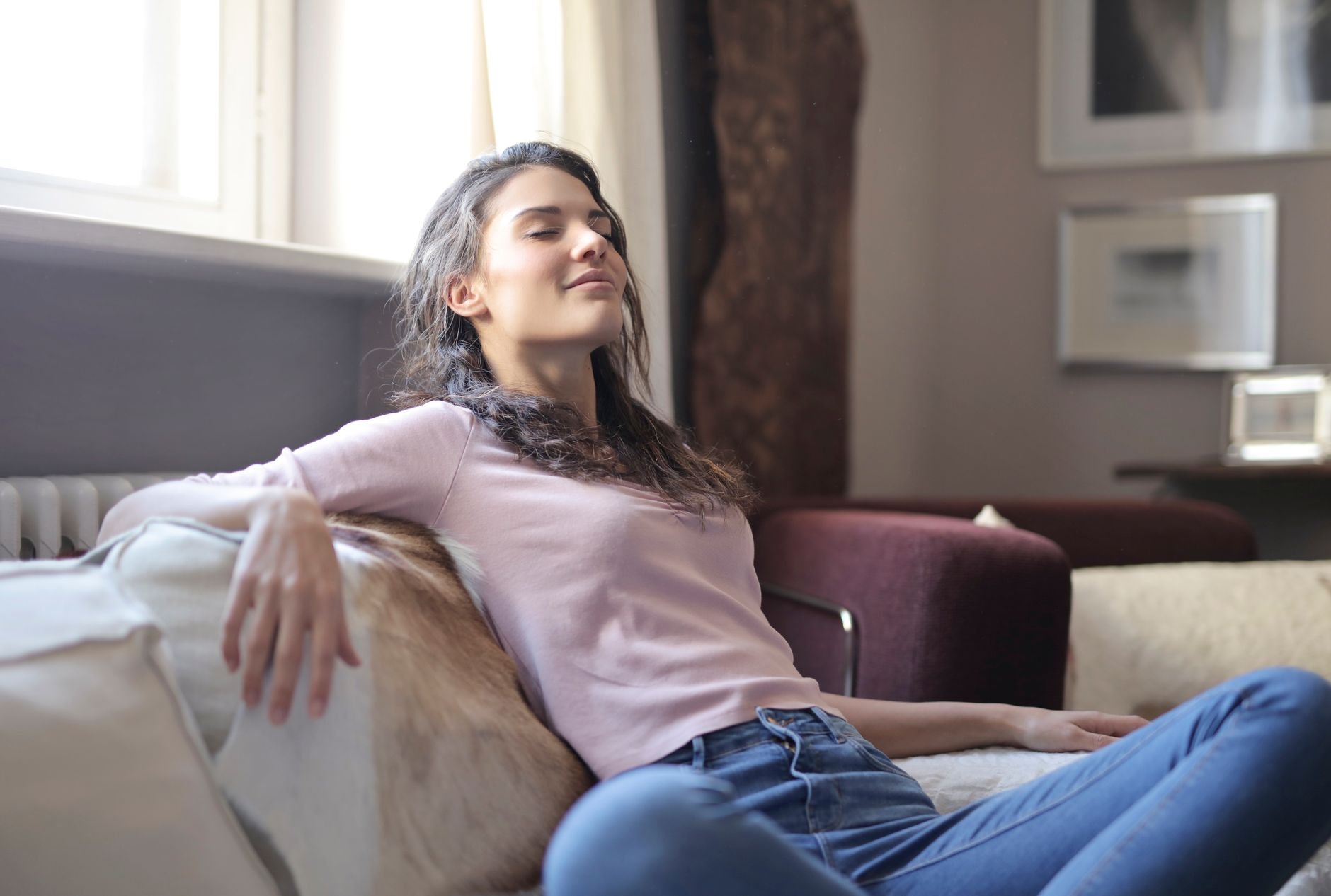 Woman relaxing comfortably at home — GLP-1 Comfort Guide