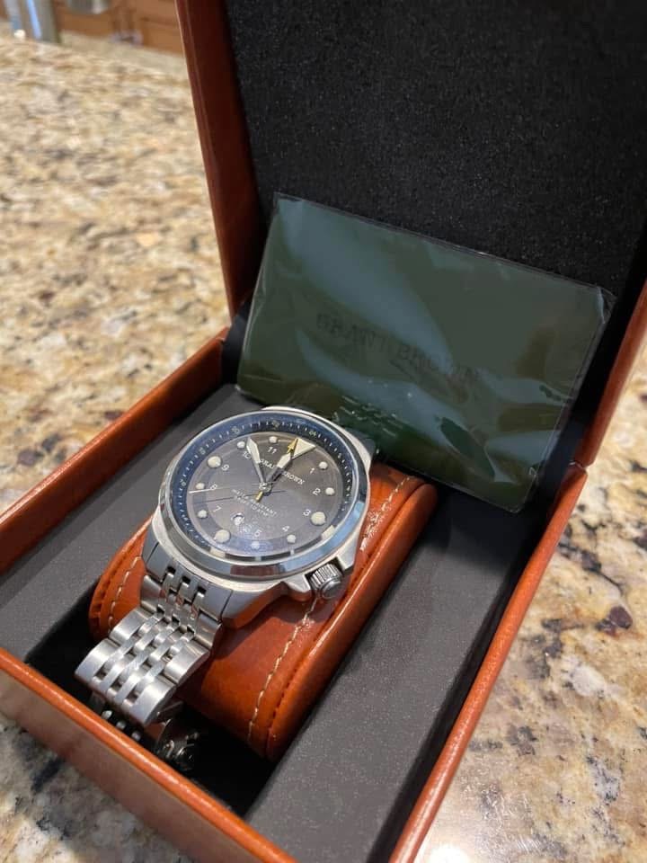 Grant Brown Challenger GMT quartz watch in cognac leather box with jubilee bracelet and documentation