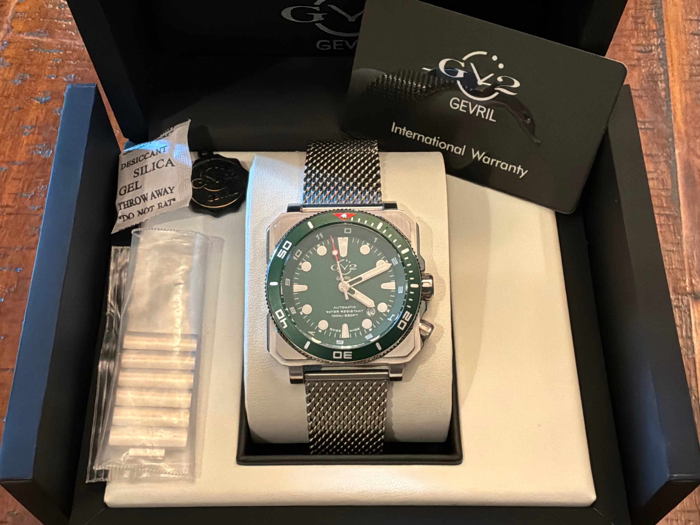 GV2 by Gevril XO Submarine green dial closeup in box showing dial and bezel detail