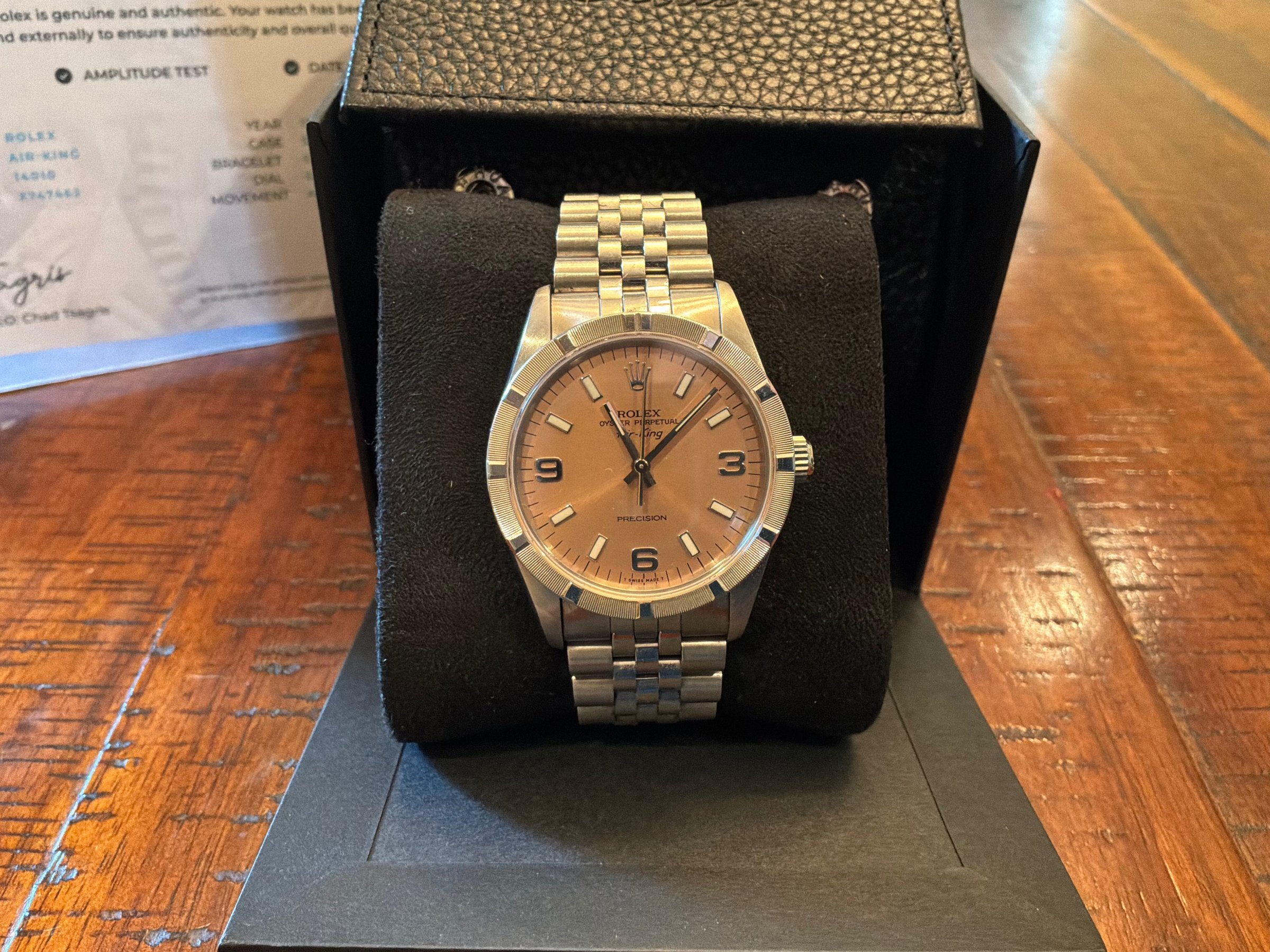 1991 Rolex Air-King Ref. 14010 with salmon dial seated in black presentation box