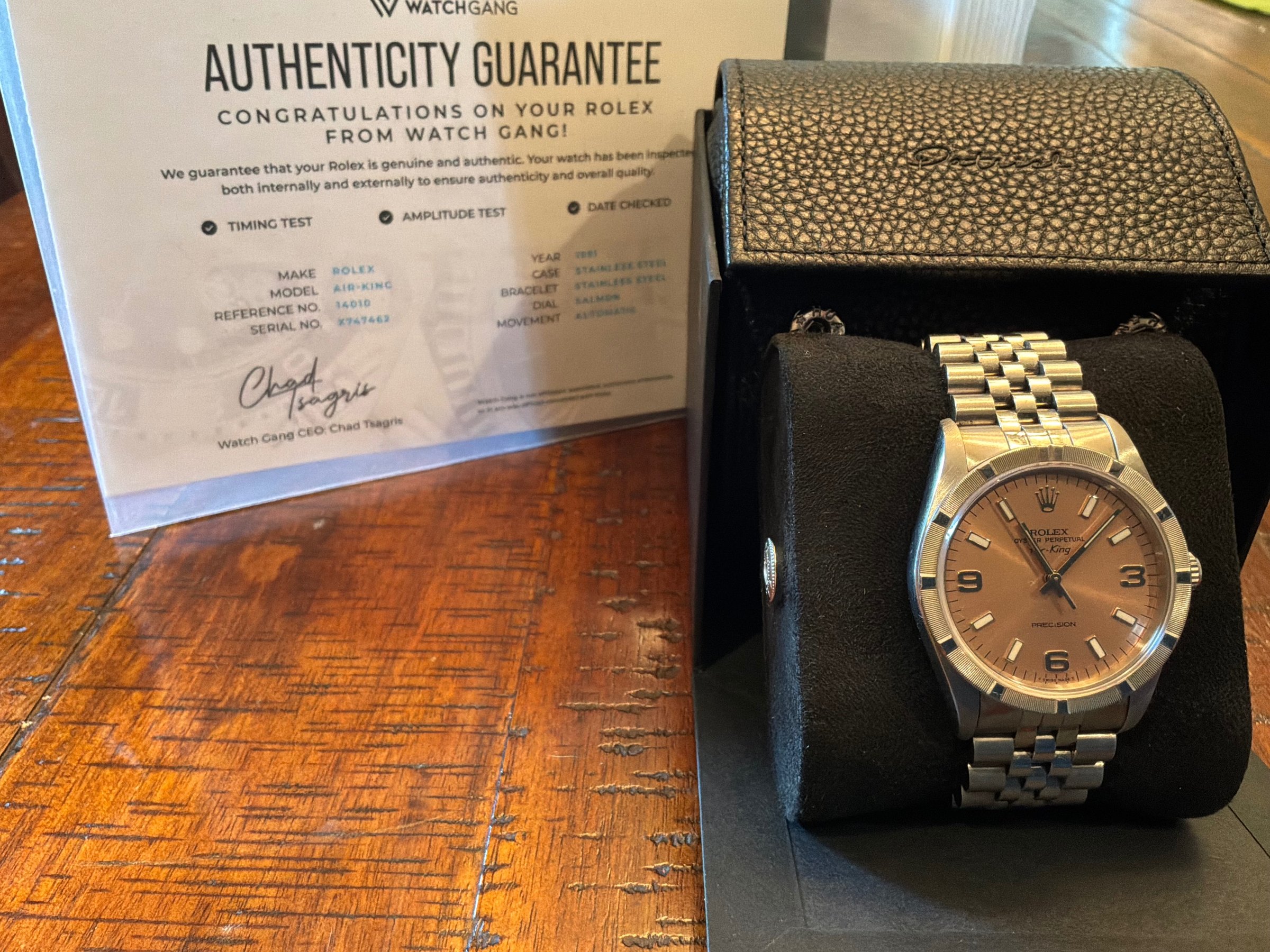 1991 Rolex Air-King Ref. 14010 with salmon dial in black presentation box, Watch Gang authenticity certificate behind