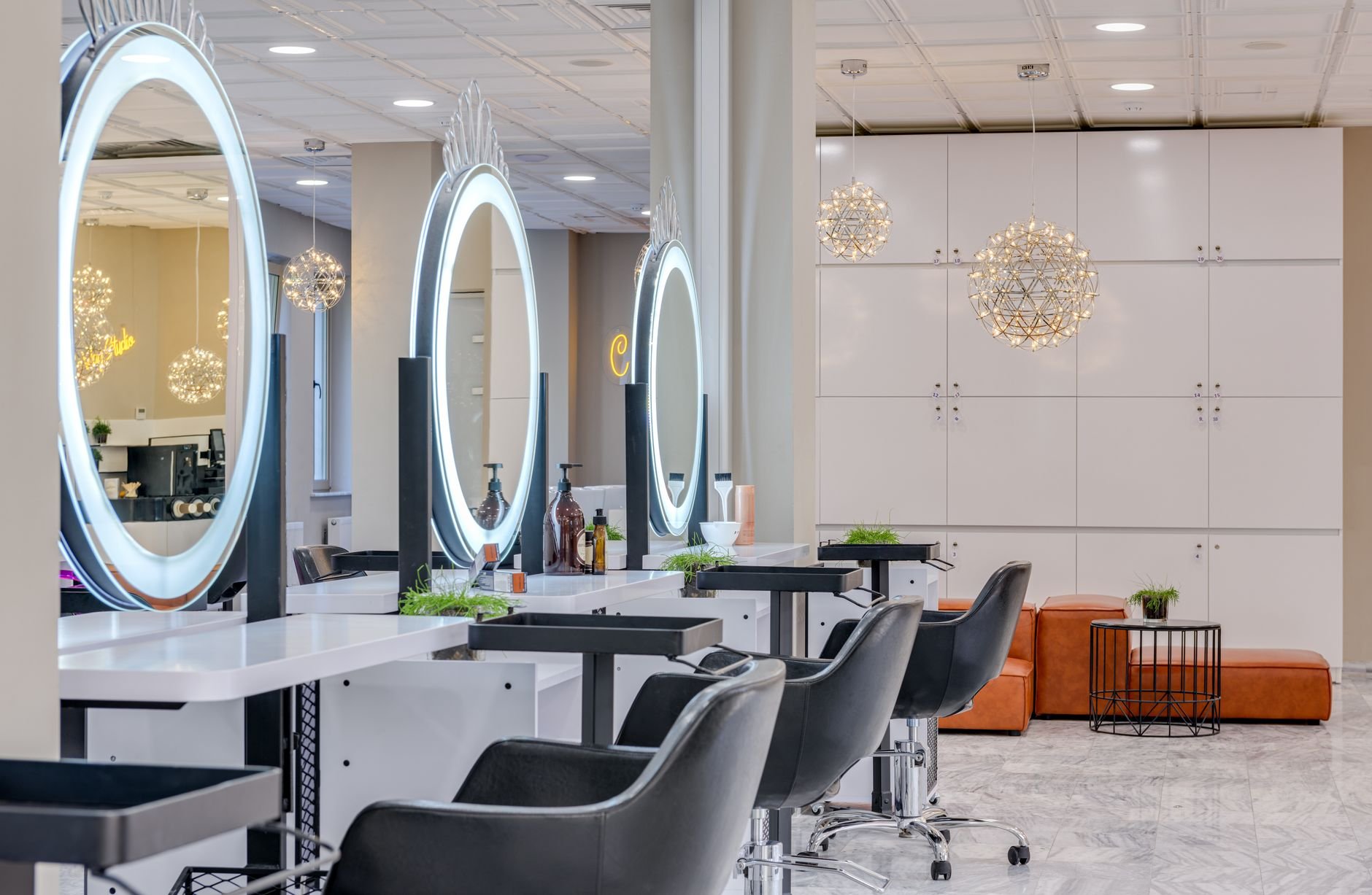 Modern hair salon interior with round mirrors